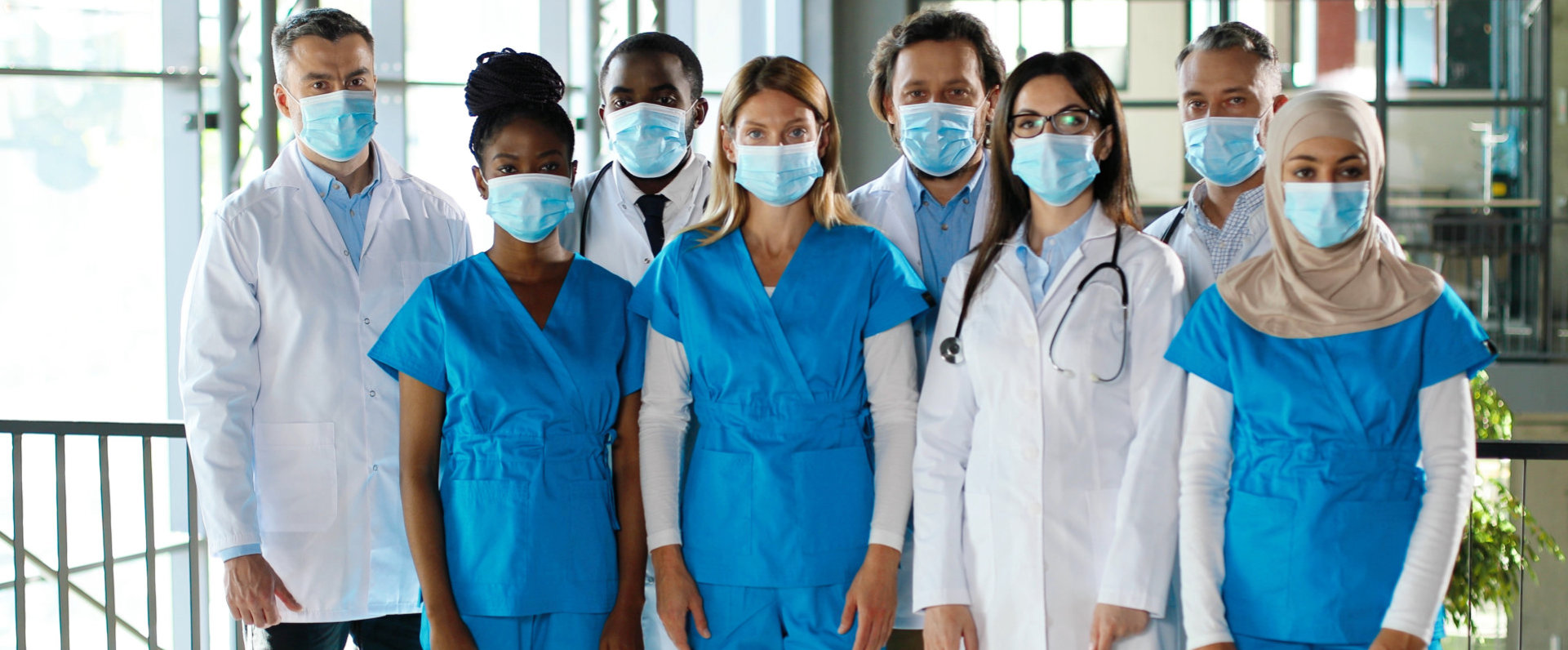 Mixed-races busy team of male and female doctors