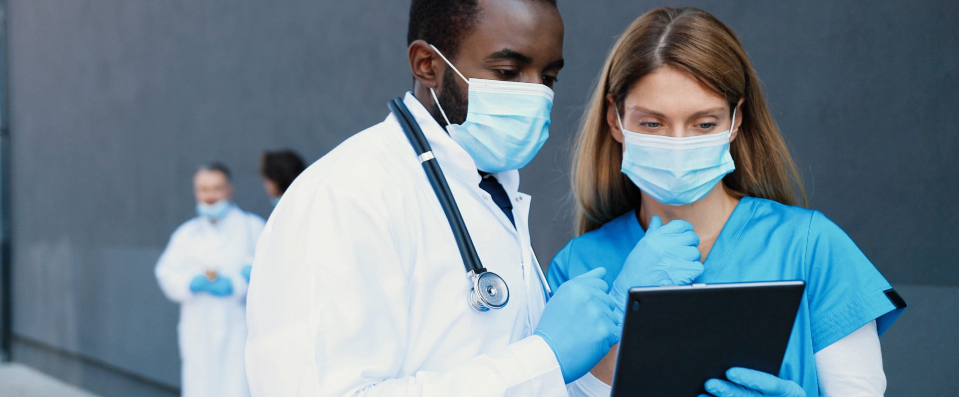 Multi ethnic male and female physicians